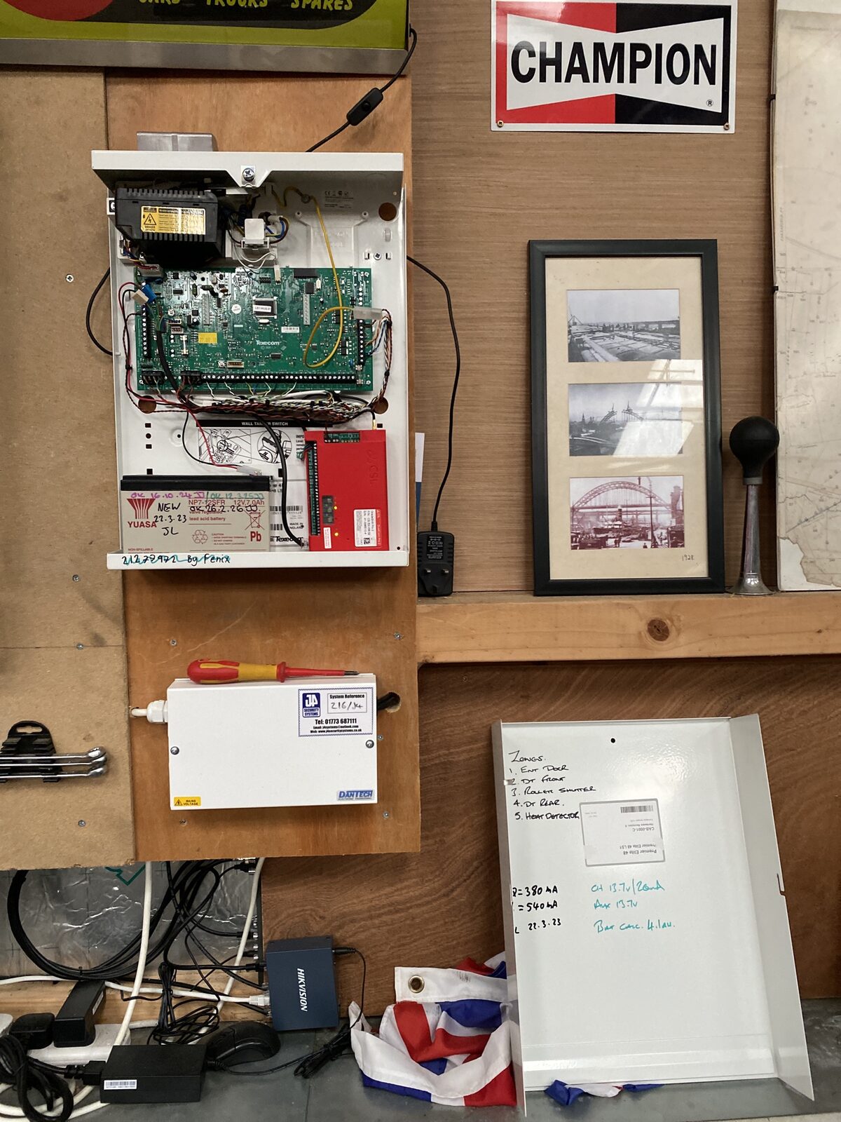 Alarm panel being serviced by a J4 Security Systems engineer